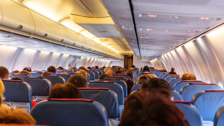 Airline passenger sparks viral debate about plus-sized seatmate issue as etiquette experts weigh in