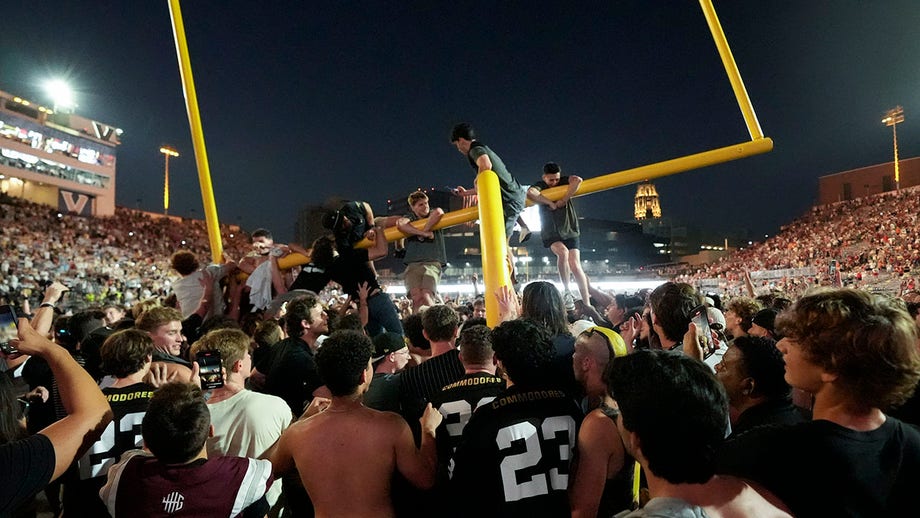 Vanderbilt's Historic Triumph: Fans Celebrate with Goalpost Parade after Stunning Upset of Alabama