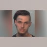 A mugshot of Aaron Moore
