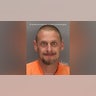 A mugshot of Ronald Macomb