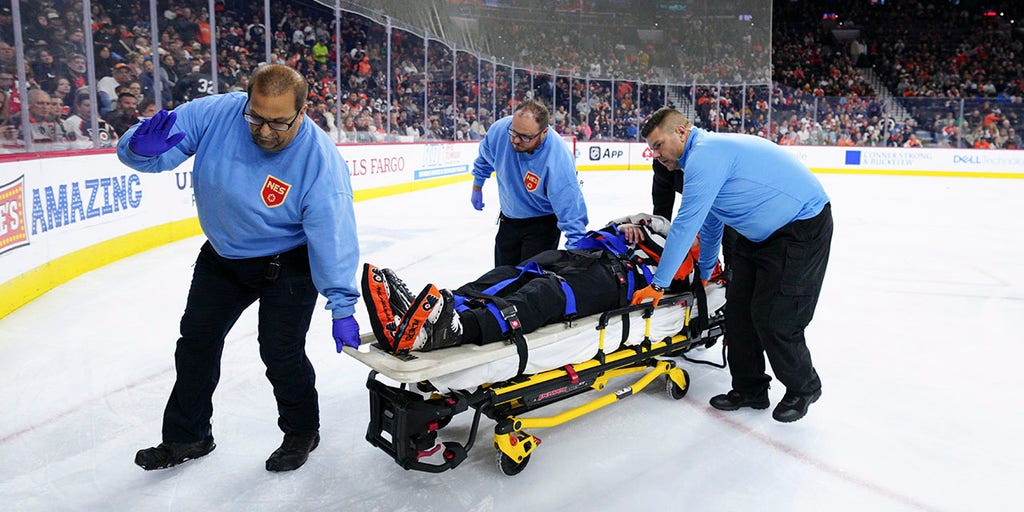 NHL ref leaves game on stretcher after colliding with Avalanche player