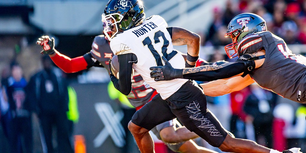 No. 20 Colorado stays alive for College Football Playoff as Heisman hopeful Travis Hunter continues dominance