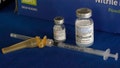 A syringe lies next to vials of COVID-19 booster vaccines at an inoculation station in Jackson, Miss., Friday, Nov. 18, 2022. - Fox News