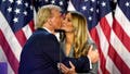 Republican presidential nominee former President Donald Trump, left, kisses Melania Trump at an election night watch party, Wednesday, Nov. 6, 2024, in West Palm Beach, Fla. - Fox News