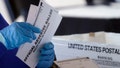 FILE - A worker at the Fulton County Board of Registration and Elections works to process absentee ballots at the State Farm Arena, Nov. 2, 2020, in Atlanta. (AP Photo/John Bazemore, File) - Fox News