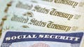 A Social Security card sits alongside checks from the U.S. Treasury. Lawmakers last week voted to give full Social Security benefits to some public sector retirees who currently receive them at a reduced level. - Fox News