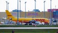 SCHKEUDITZ, GERMANY - OCTOBER 15: A cargo airplane of the DHL package delivery company stands on the tarmac at Leipzig/Halle Airport on October 15, 2024 in Schkeuditz, Germany. Investigators suspect Russian sabotage behind the fire originating from a package at the DHL airport center last July. According to authorities, the late arrival of the package on a plane from a Baltic country resulted in the package igniting on the ground. Had it arrived on time, the package would have ignited on the outgoing flight and caused the airplane to crash. - Fox News