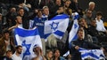 Israel fans with flags in the stands. - Fox News