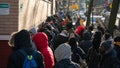 Migrants line up outside a migrant re-ticketing center at St. Brigid School on E. 7th St. Friday, Jan. 5, 2024, in Manhattan, New York City. (Barry Williams/New York Daily News/Tribune News Service via Getty Images) - Fox News