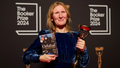 Samantha Harvey poses with the trophy and her book "Orbital" after winning the Booker Prize award 2024, in London, Tuesday, Nov. 12, 2024. - Fox News