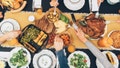 Overhead view of big family eating from table during Christmas dinner - Fox News