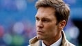 Oct 27, 2024; Seattle, Washington, USA; FOX commentator Tom Brady stands on the sideline before a game between the Seattle Seahawks and Buffalo Bills at Lumen Field. - Fox News