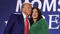 WASHINGTON, DC - AUGUST 30: Republican presidential nominee, former U.S. President Donald Trump (L) and Co-founder of Moms for Liberty Tiffany Justice (R) share a moment during the 2024 Joyful Warriors National Summit on August 30, 2024 in Washington, DC. Trump continued to campaign for the upcoming presidential election on November 5, 2024. (Photo by Alex Wong/Getty Images) - Fox News