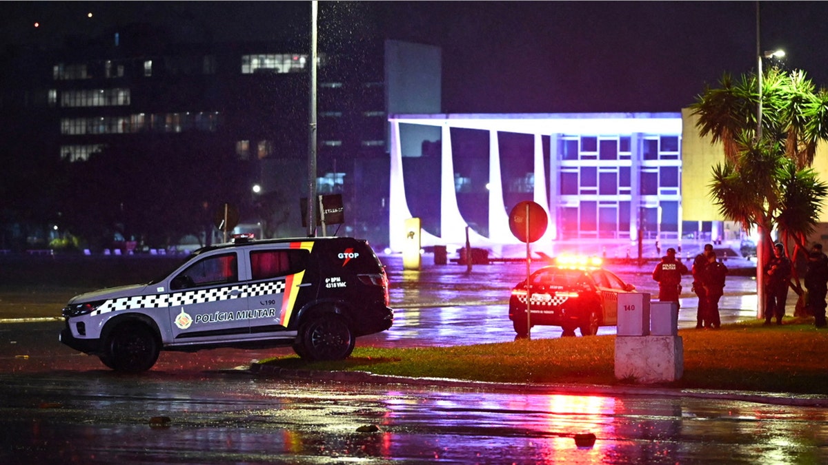 Police vehicles in front of Brazilian Supreme Court