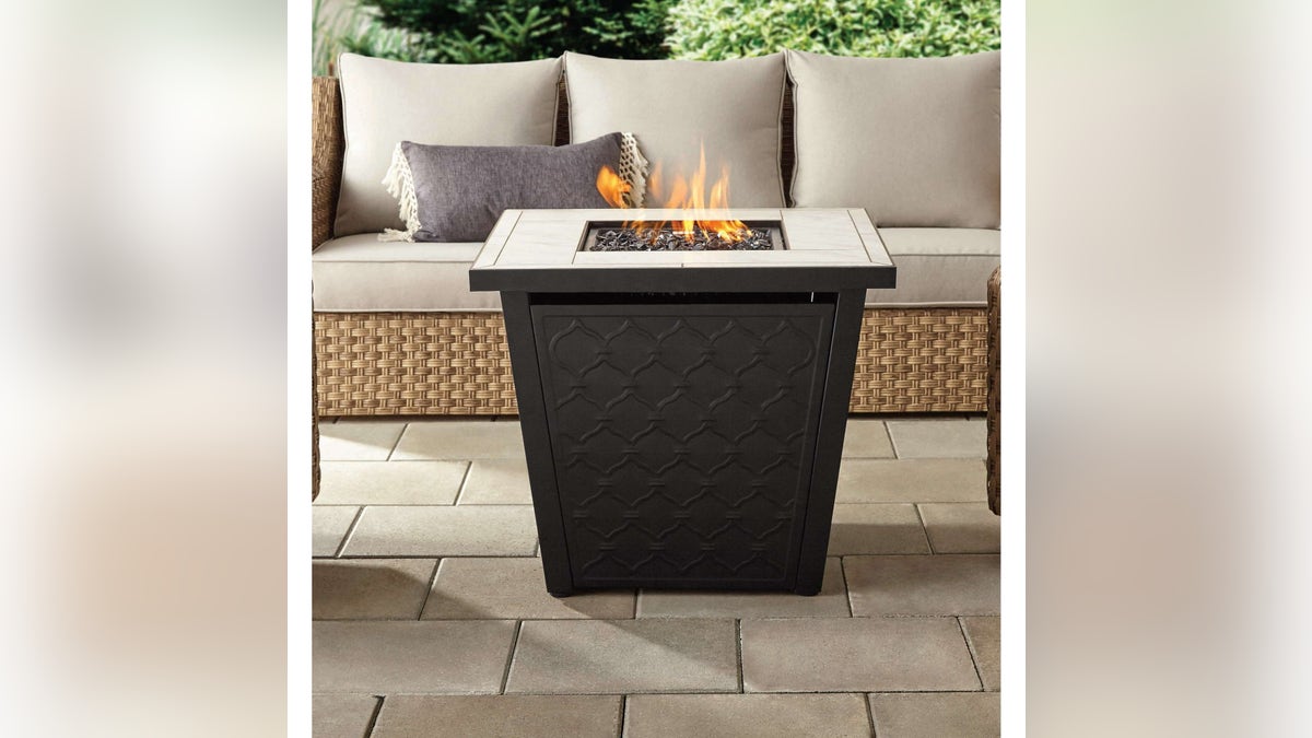 A low-maintenance gas fire pit table is clean-burning, functional and convenient.