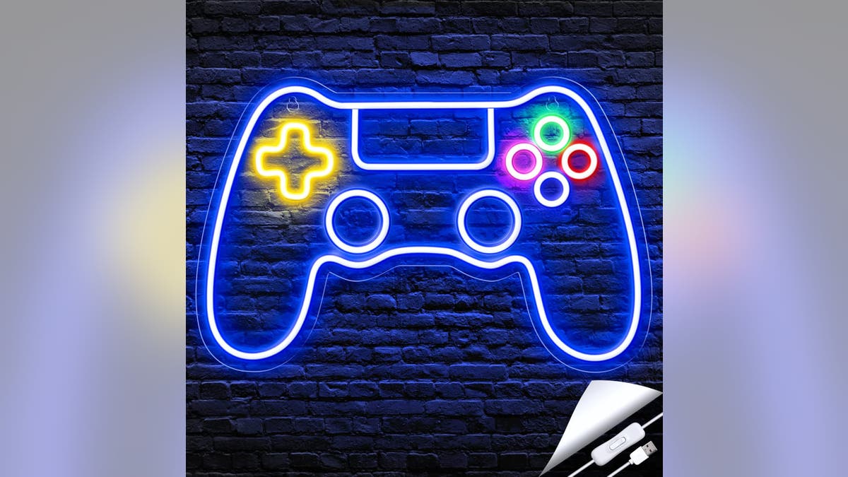 Add some fun to the gaming den with this sign.?