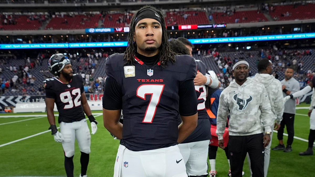 CJ Stroud stands on field