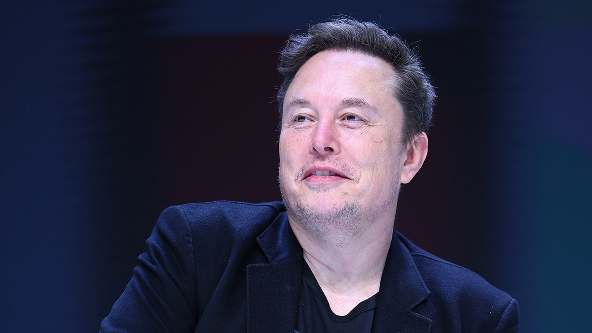 Elon Musk wearing black