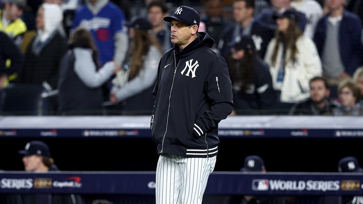 Aaron Boone walks