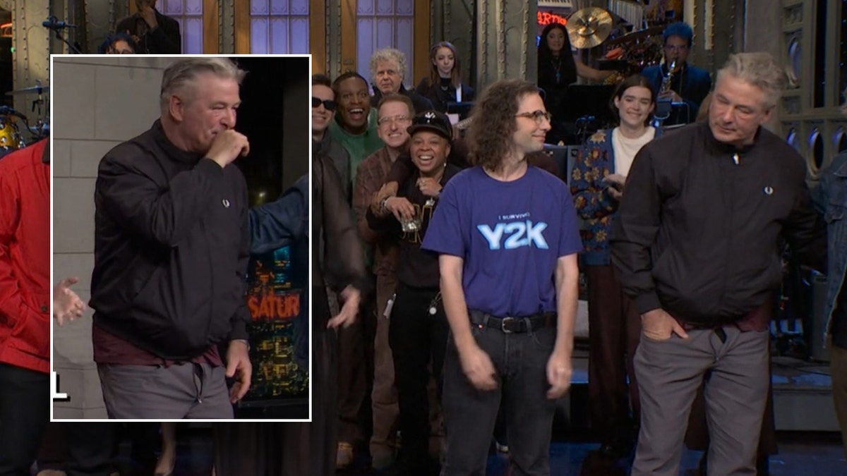 Actor Alec Baldwin wears achromatic  overgarment   and slacks connected  Saturday Night Live.