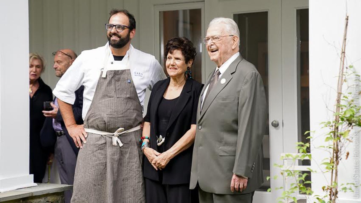 Alon Shaya at Rescue Recipes event photographed with Joan Nathan and Steven Fenves