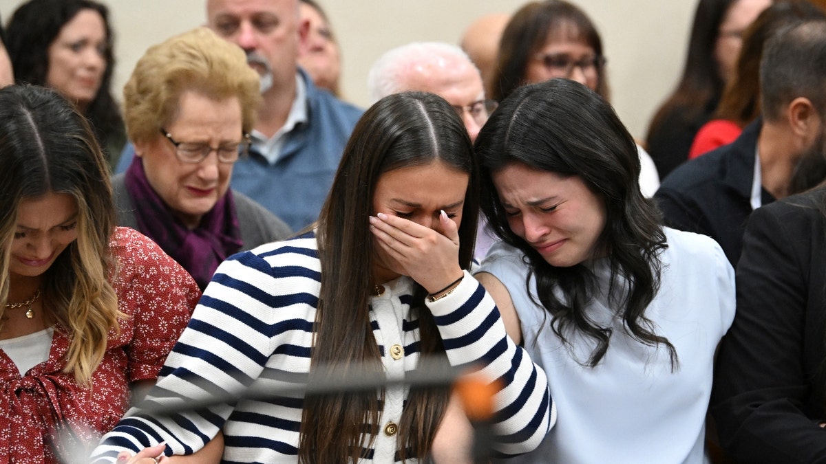 From left, Connolly Huth, roommate of Laken Riley, Lauren Phillips, sister of Laken Riley, and Sofia Magana, roommate of Laken Riley, react as Superior Court Judge H. Patrick Haggard announces the verdict during a trial of Jose Ibarra at Athens-Clarke County Superior Court, Wednesday, Nov. 20, 2024, in Athens, Ga.