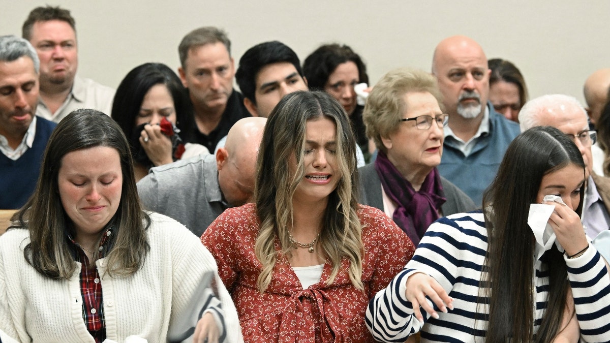 Family members and friends of Laken Riley react as Superior Court Judge H. Patrick Haggard announces the verdict during a trial of Jose Ibarra at Athens-Clarke County Superior Court, Wednesday, Nov. 20, 2024, in Athens, Ga.