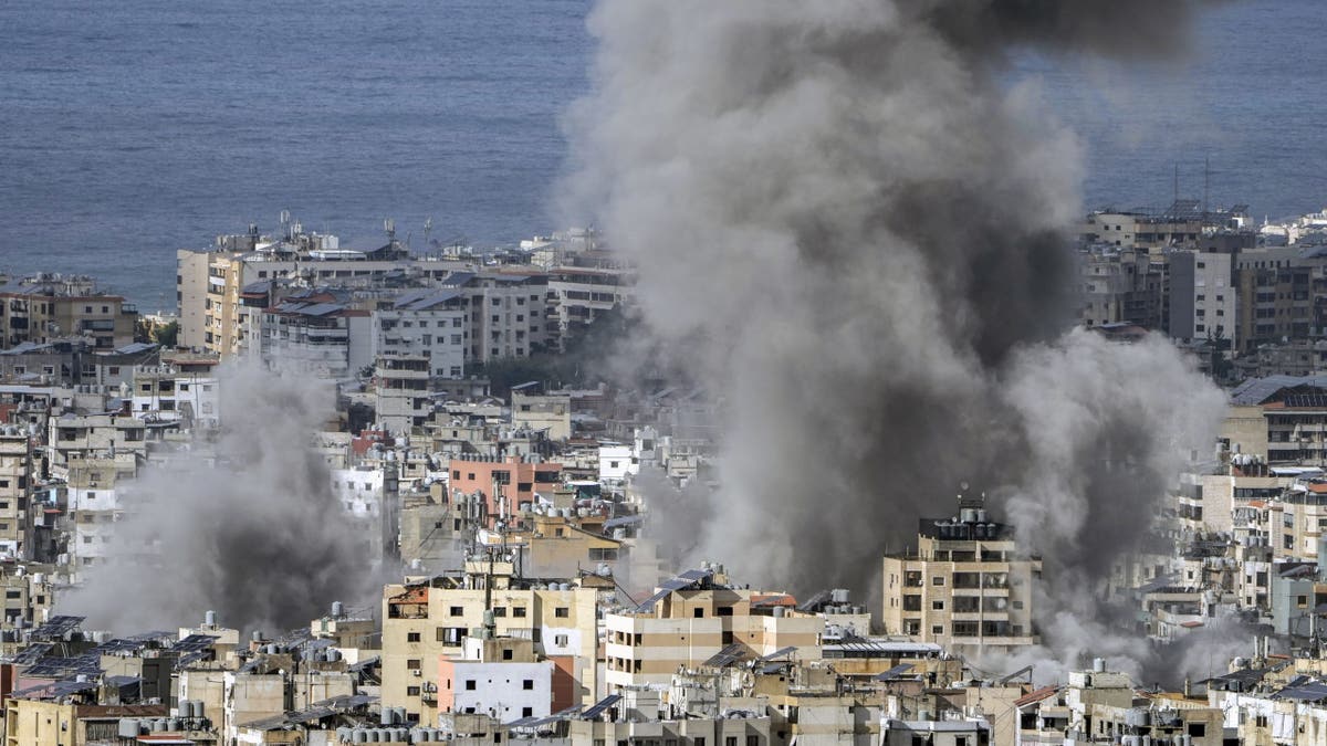 Smoke billows after an Israeli airstrike in a suburb of Beirut