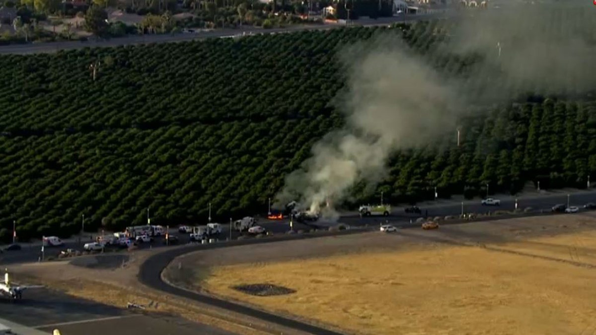 plane wreckage on fire