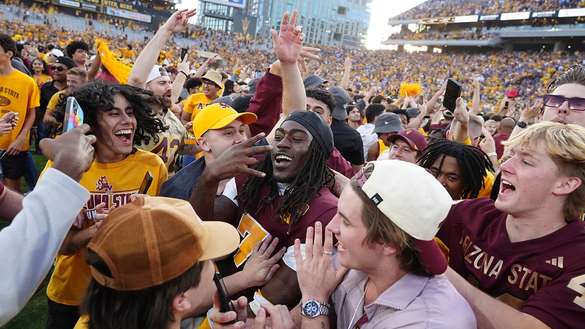 Arizona State fans on the field