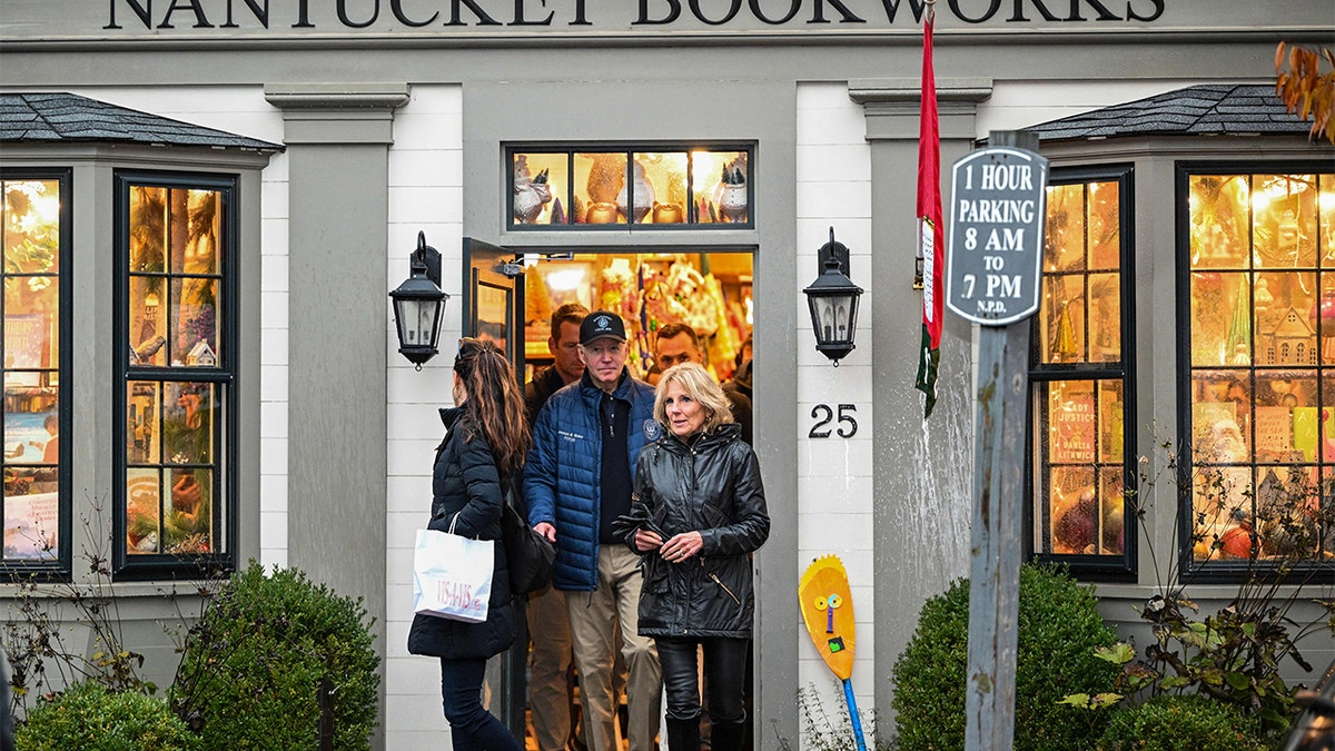 US President Joe Biden, First Lady Jill Biden, and the Presidents daughter, Ashley Biden, leave Nantucket Bookworks after having lunch in Nantucket, Massachusetts, on November 25, 2022. - The President is spending the Thanksgiving holiday with his family in Nantucket.