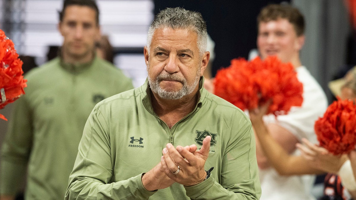 Bruce Pearl looks on