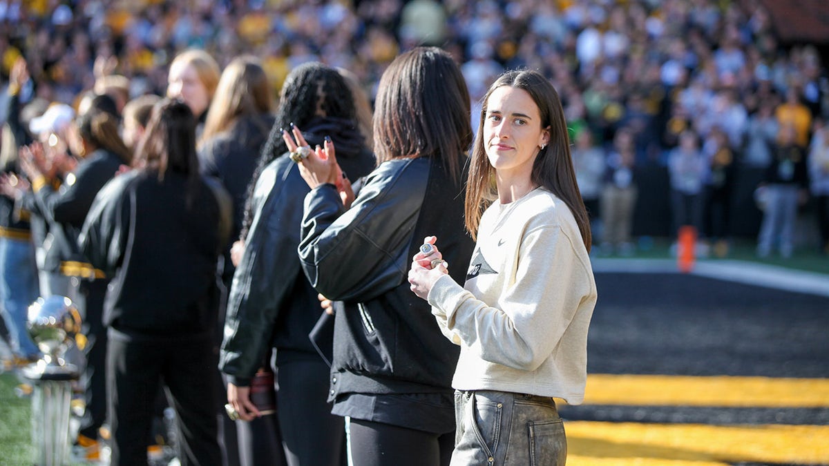 Caitlin Clark attends a game