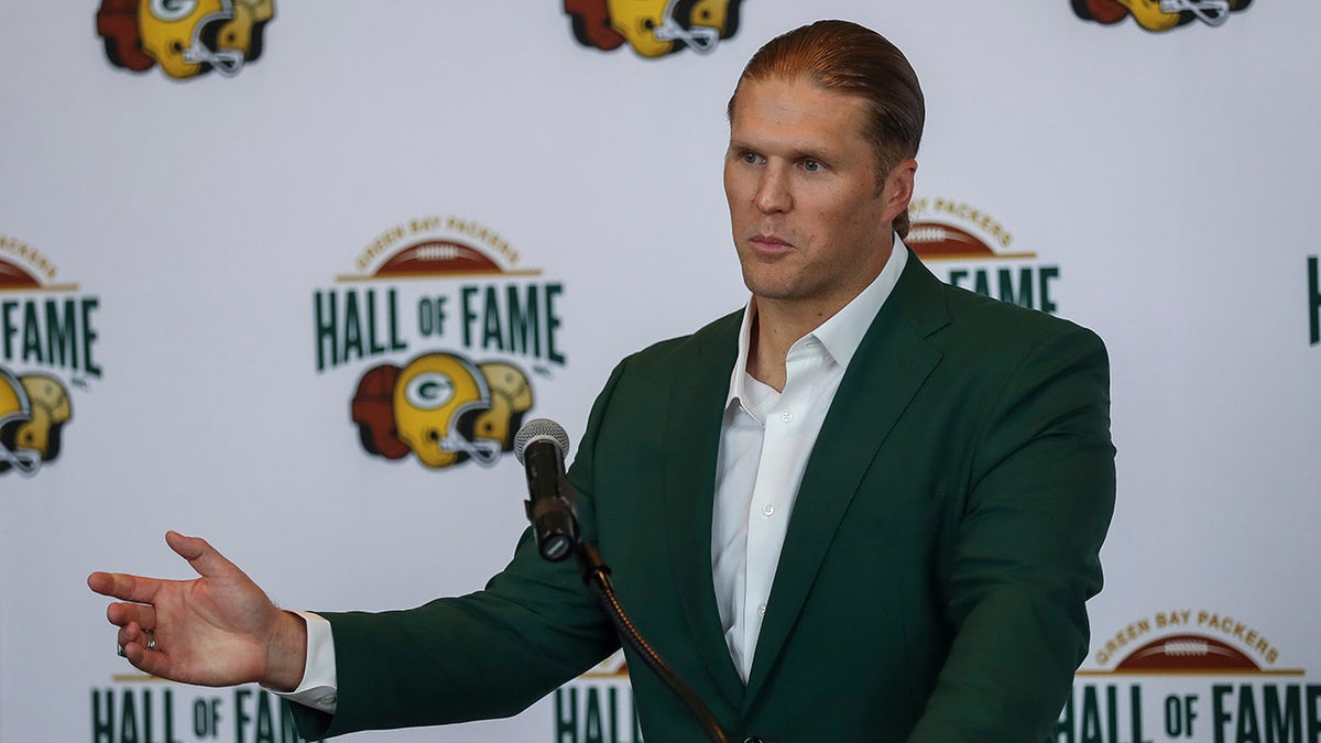 Clay Matthews speaks at podium