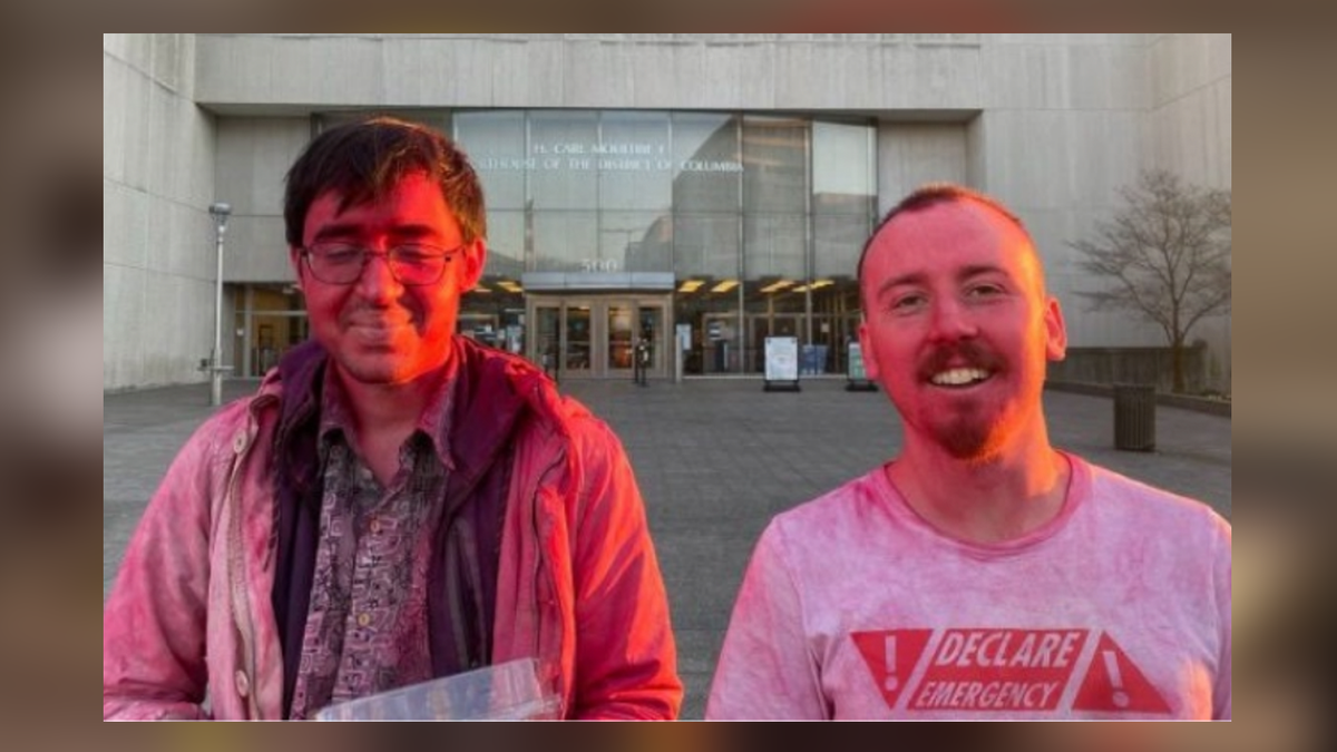 Donald Zepeda (L) and Jackson Green (R) covered in red