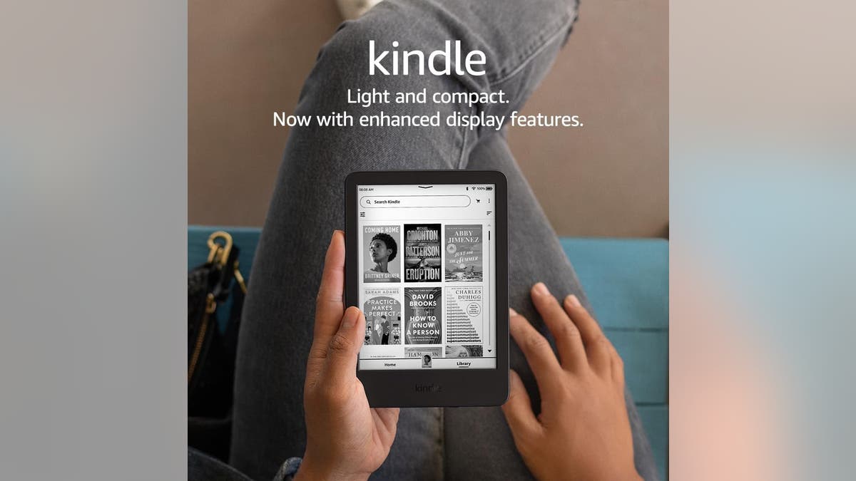 Buy the lightest and most compact Kindle available.