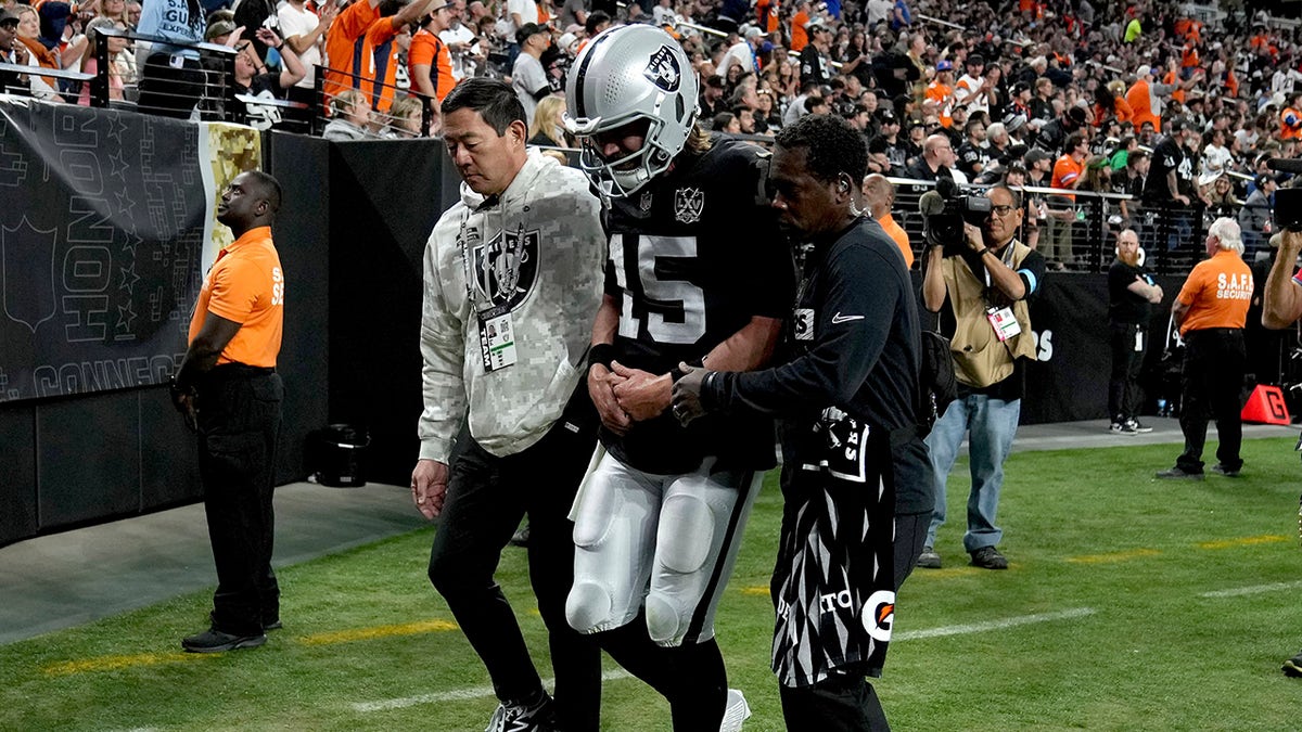 Gardner Minshew being helped off field