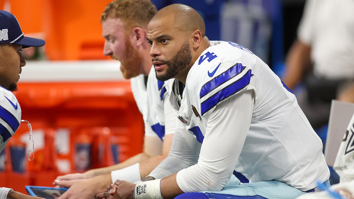 Dak Prescott sits on bench