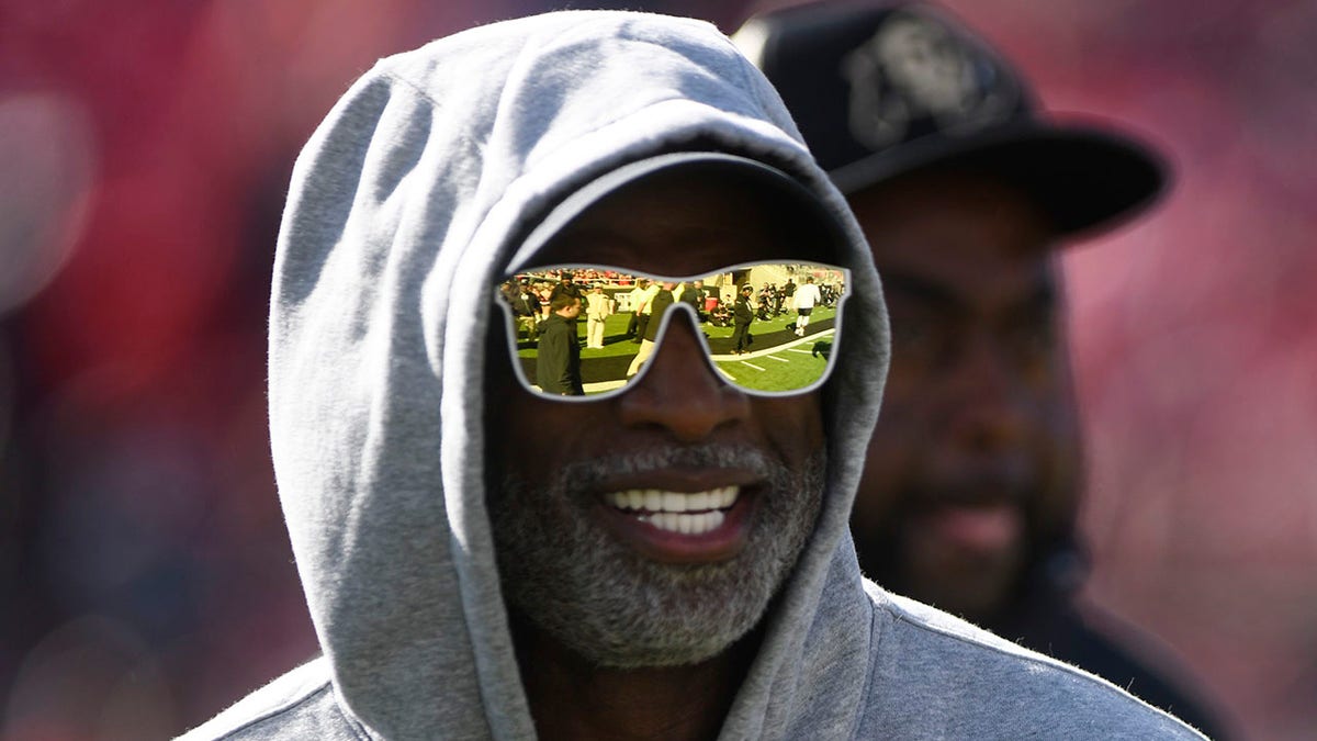 Deion Sanders smiles