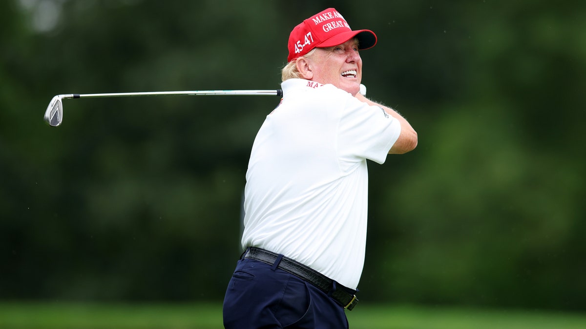 Donald Trump plays golf