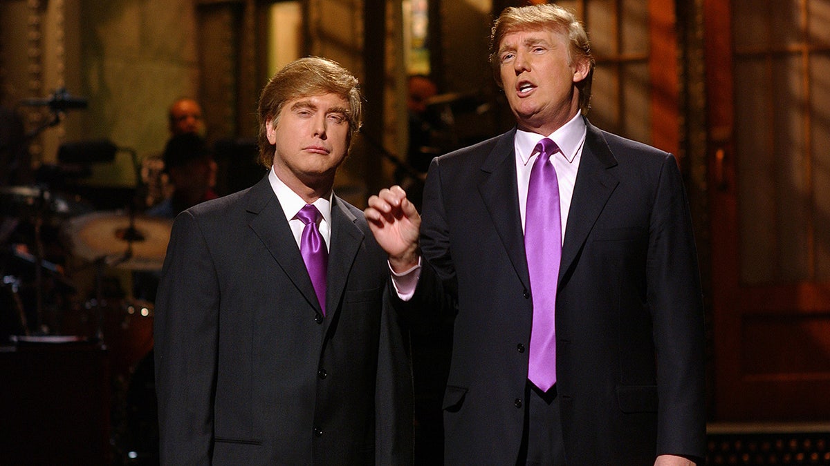 Darrell Hammond standing next to Donald Trump on "SNL" stage