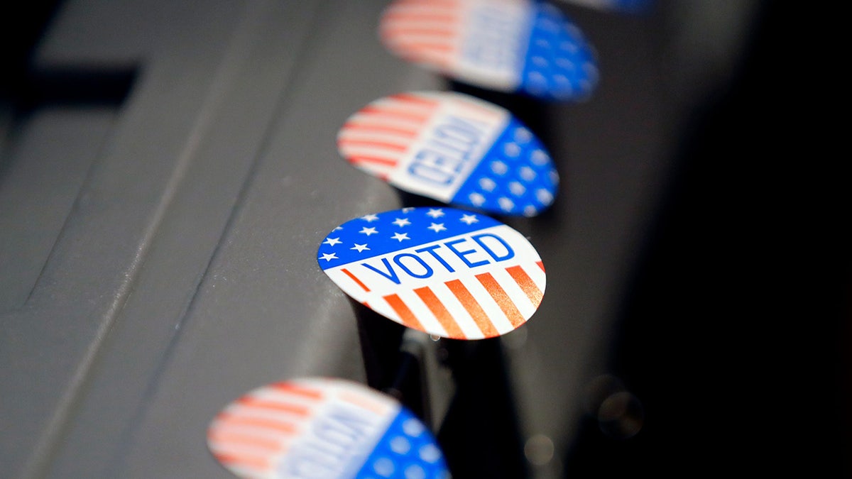 I Voted stickers are ready to be handed out as citizens go through the voting process at Scheig Center & Gardens on Election Day.