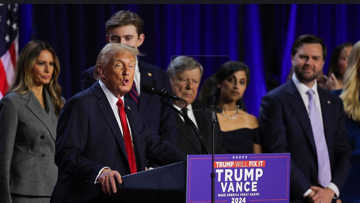 Republican presidential nominee and former U.S. President Donald Trump speaks accompanied by Melania Trump, Barron Trump, Vice Presidential Nominee Senator J.D. Vance, Usha Chilukuri Vance, and  Ivanka Trump, following early results from the 2024 U.S. presidential election in Palm Beach County Convention Center, in West Palm Beach, Florida, U.S., November 6, 2024.