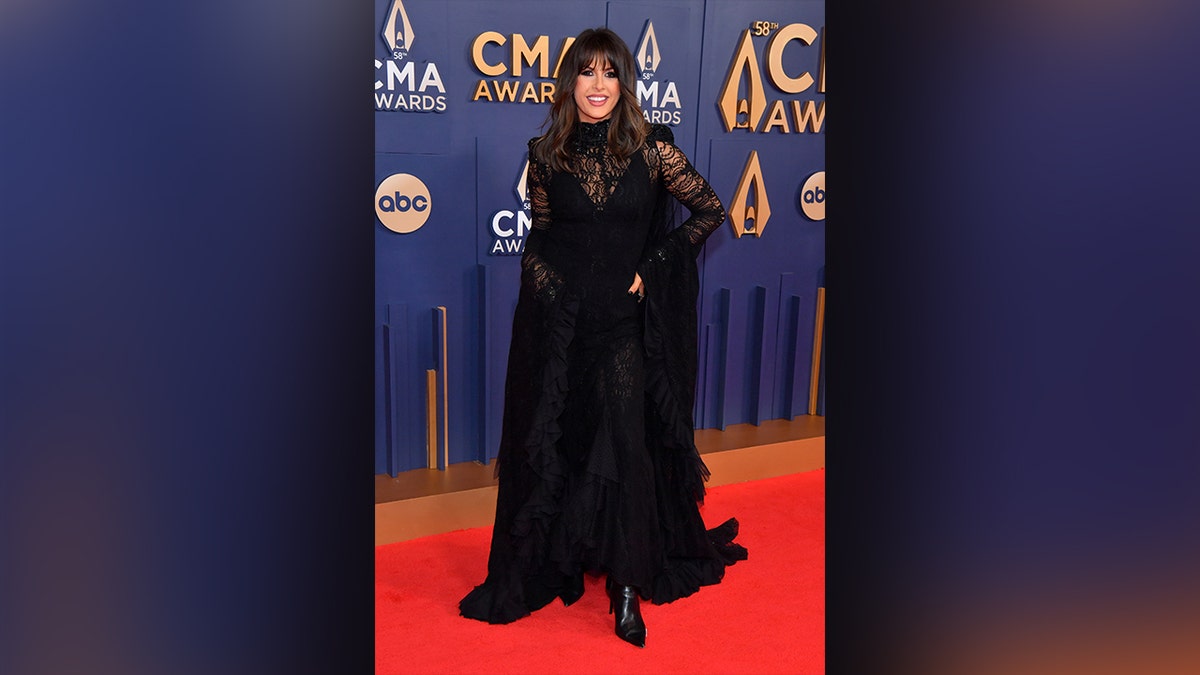 Ella Langley, who is performing at the CMA Awards tonight, arrived to the award show in a sheer black dress with lace designs.