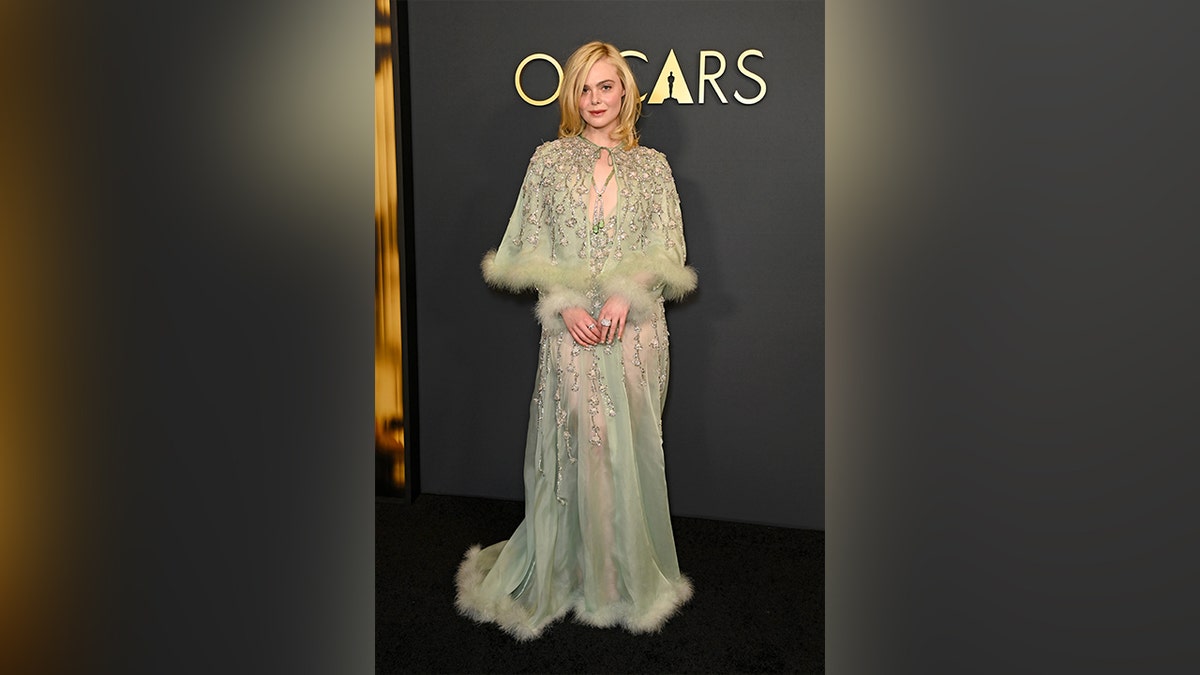 Elle Fanning wore a bejeweled light blue see-through Valentino gown to the Governors Awards.