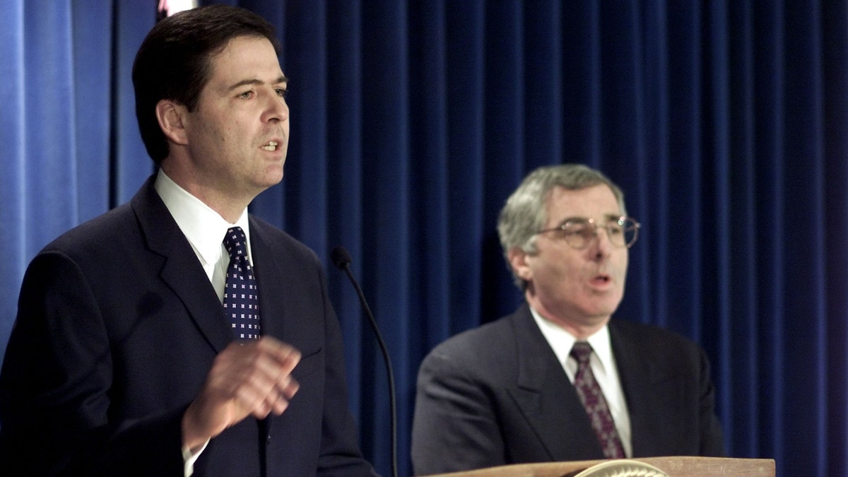 James B. Comey (L), U.S. Attorney for the Southern District of New York and Kevin P. Donovan (R), assistant director in charge of the New York FBI office and announce that IMClone Systems founder Samuel Waksal, has pleaded guilty to conspiracy and wire fraud March 3, 2003 in New York City.