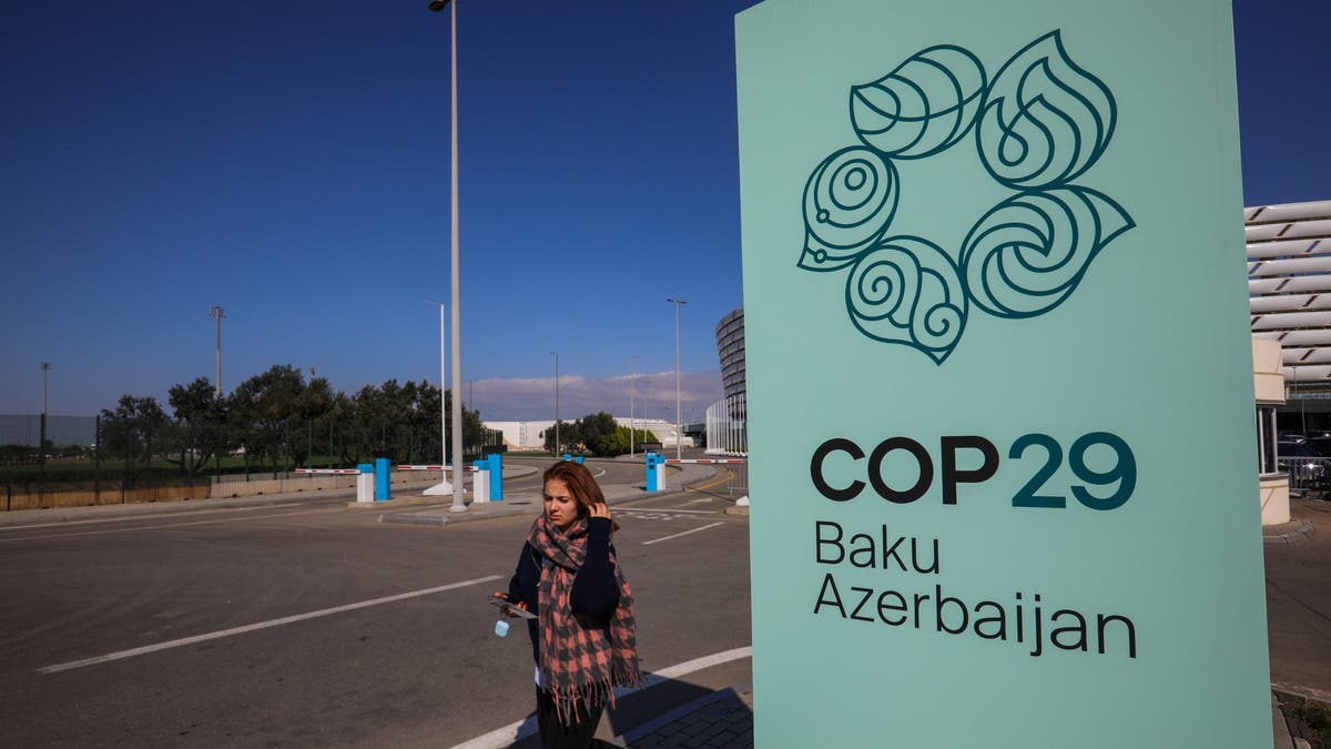 A young girl walks near the Baku Olympic Stadium, the venue of the COP29 United Nations Climate Change Conference on Oct. 23, 2024 in Baku, Azerbaijan. The 2024 U.N. Climate Change Conference will convene in November 2024 in Baku.