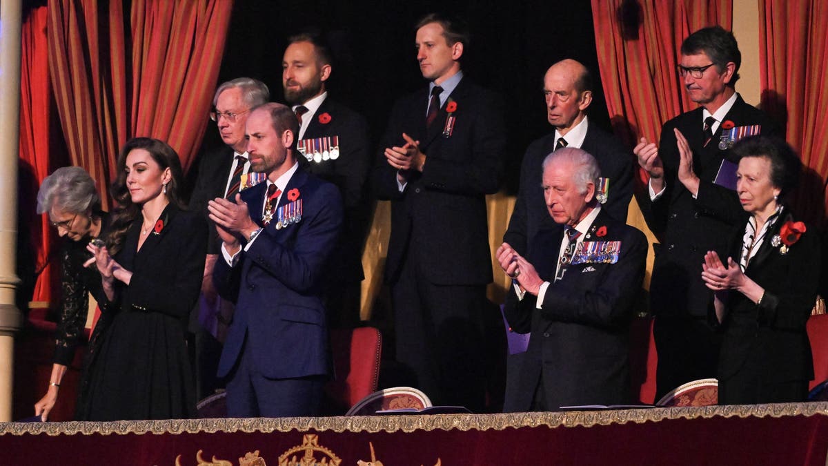 the royal family clapping at festival of remembrance