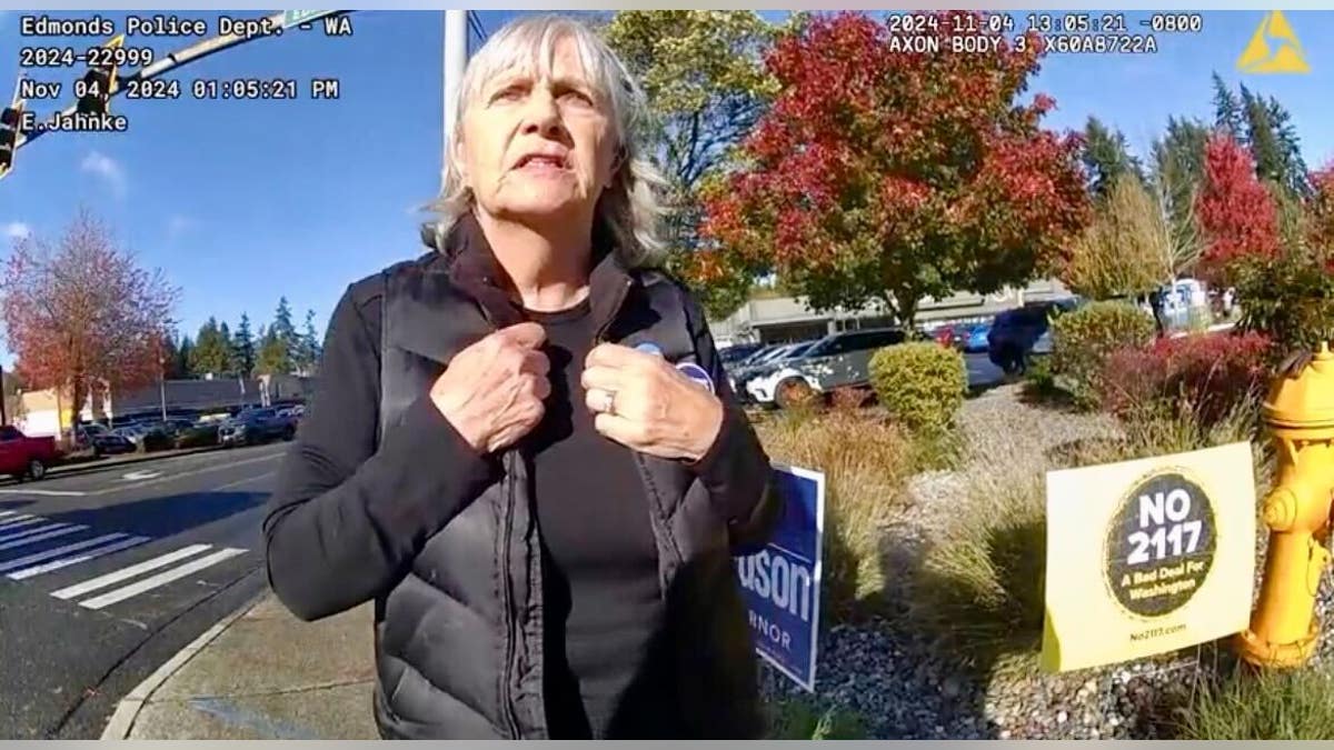 The woman allegedly confronted two Trump supporters based on their skin color, police said.