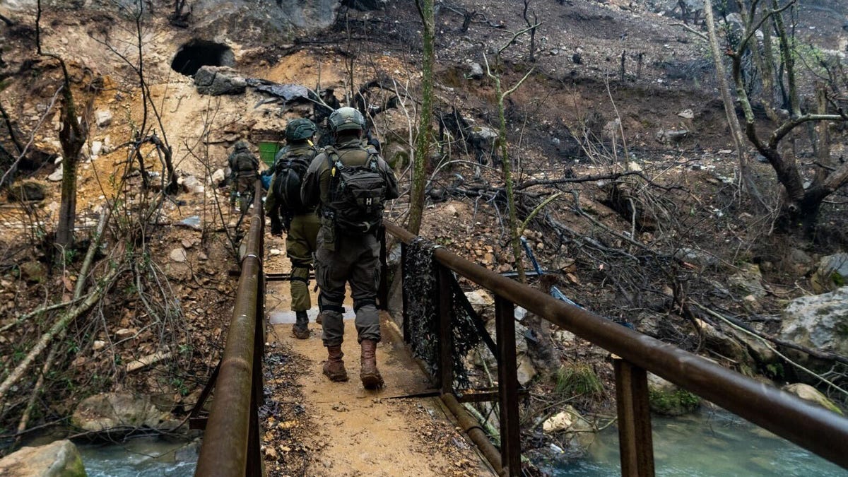 Israeli soldiers near the Litani River